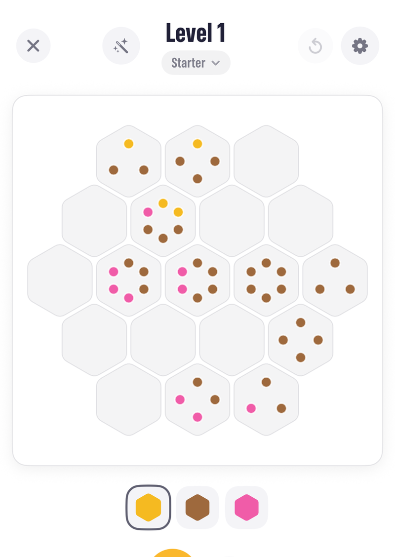 The Pocketful Seeds screen with a honeycomb of empty tiles, some carrying coloured seed dots, and a three-colour palette below